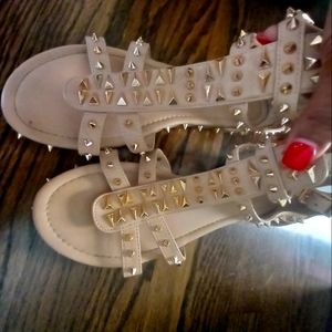 Pre-owned size 10 spike flip flops